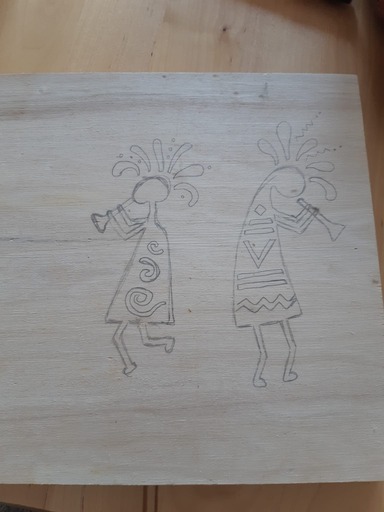 Dibujo a la lapiz sobre madera